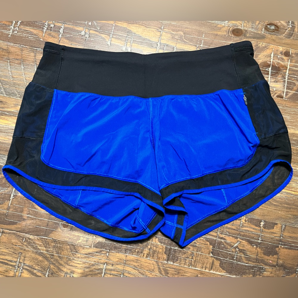 Lululemon athletic shorts. Royal blue and black. Size 8.